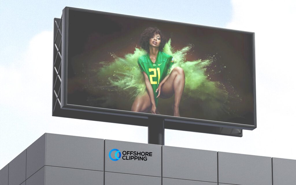 Commercial photo retouching of a model displayed on a billboard, enhancing skin tone, clarity, and overall visual appeal for advertising.