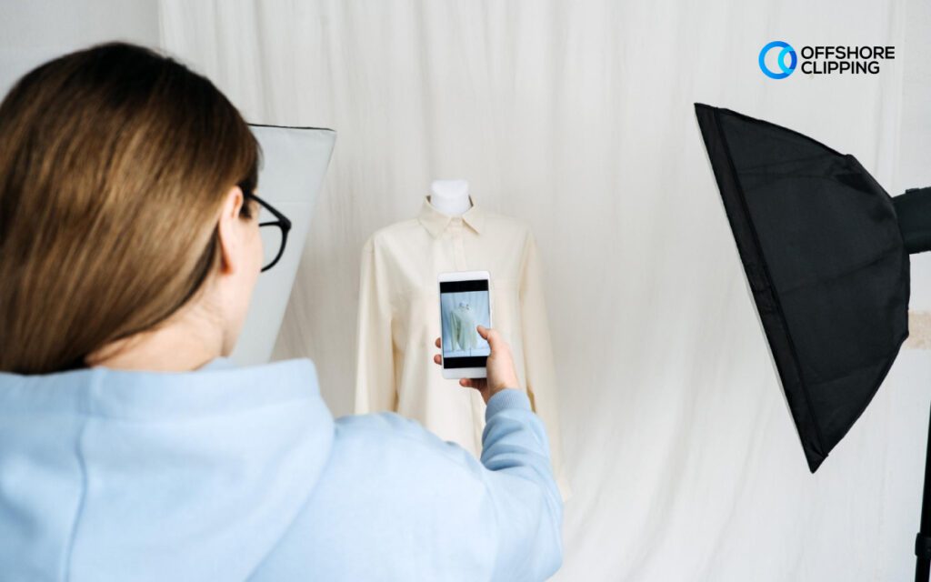 Hanging product photography of a shirt captured by a phone