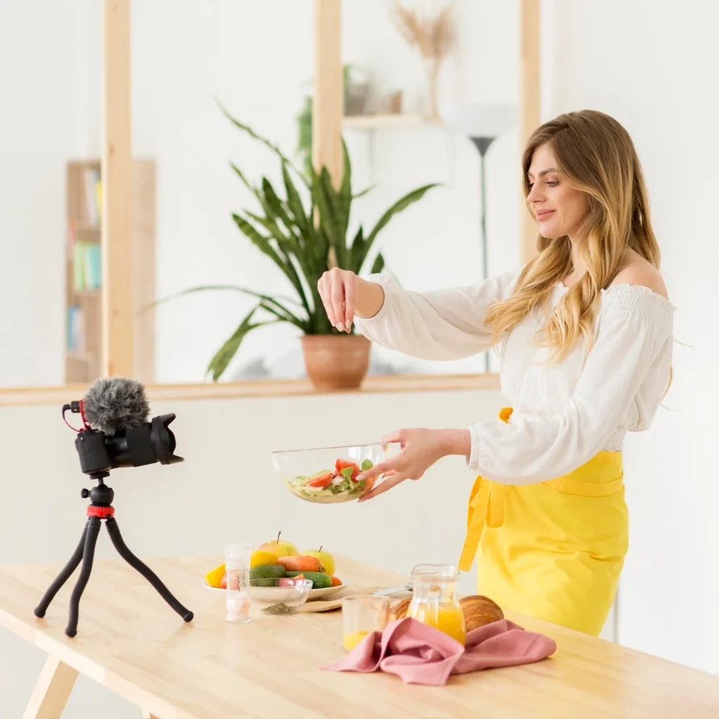 Authentic lifestyle product photography showing a content creator preparing food for a branded social media shoot.