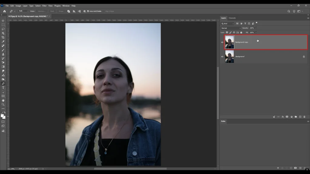 Duplicating the background layer before editing to protect the original file