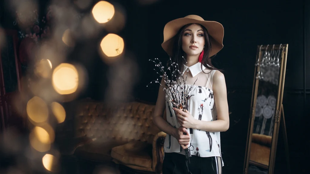 Fashion model posing indoors for an editorial fashion photography shoot