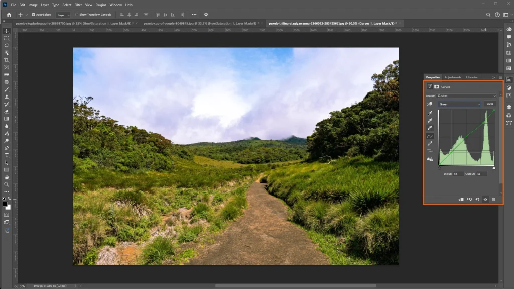 Photoshop Curves adjustment modifying the green channel to balance colors in a landscape