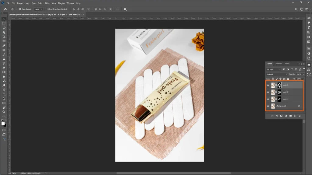 Photoshop Layers panel showing multiple layer masks applied to a product photograph