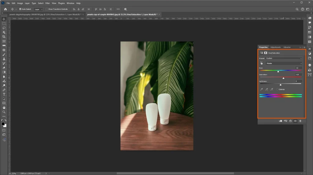 Photoshop Hue and Saturation panel correcting the colors of cosmetic product packaging