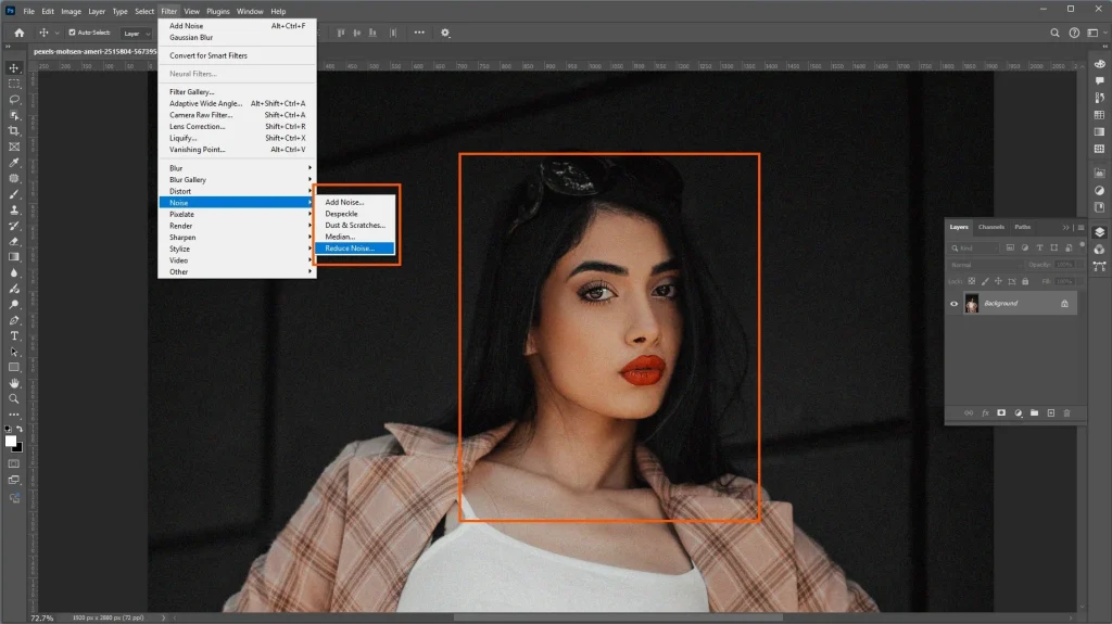 Photoshop Reduce Noise filter selected to remove grain while preserving portrait details
