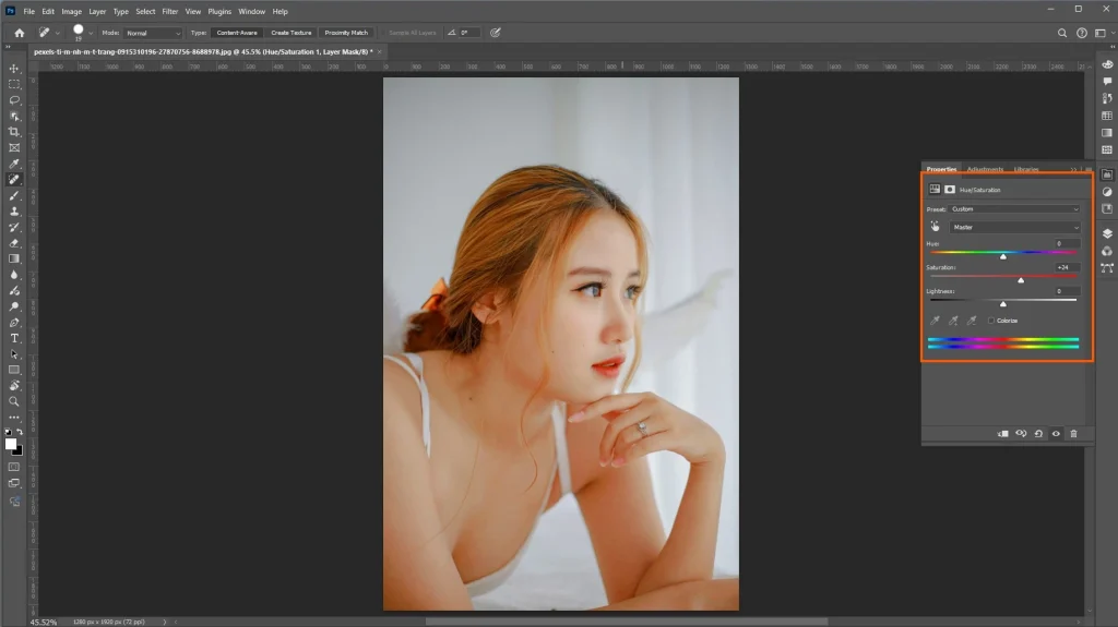 Photoshop Hue and Saturation adjustment increasing the color intensity of a portrait