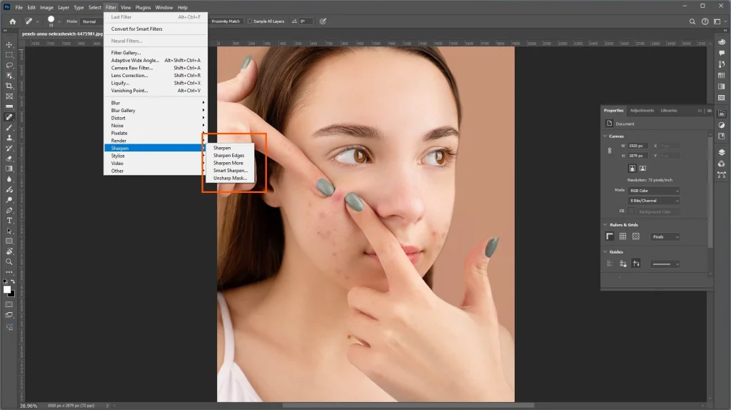 Photoshop Sharpen menu showing options for improving selected image details