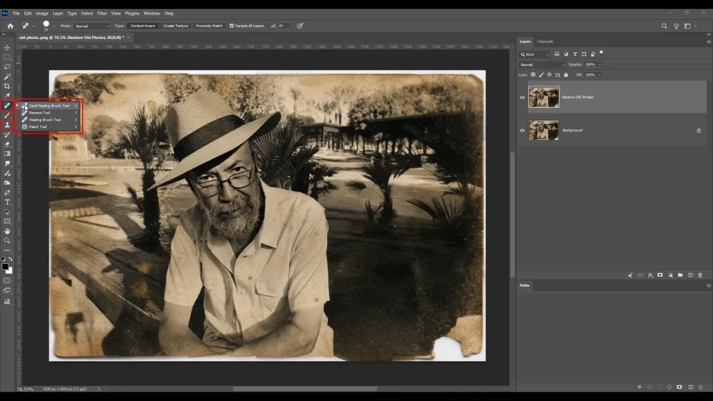Using Spot Healing Brush Tool in Photoshop to remove dust and small scratches from old photo