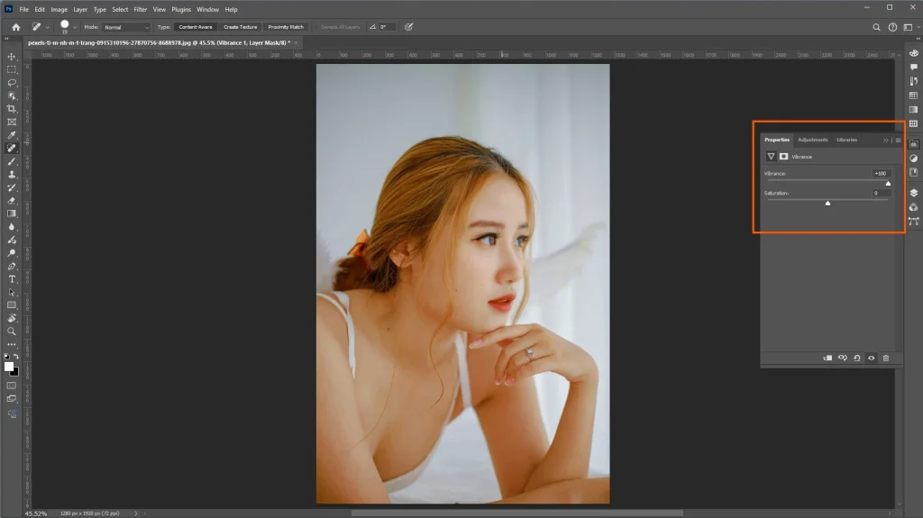 Photoshop Vibrance adjustment enhancing muted colors while preserving natural skin tones