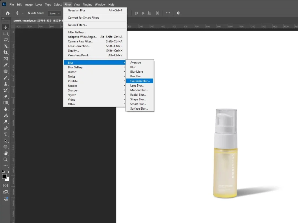 Filter menu showing Blur then Gaussian Blur selected in Photoshop to soften a realistic shadow.