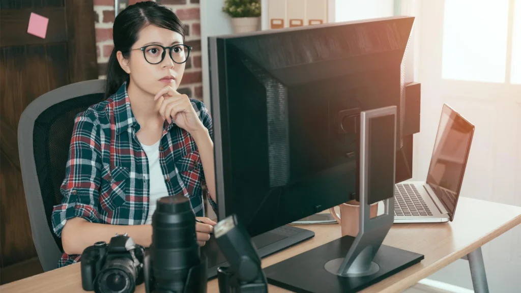 Photographer pausing to evaluate whether a photo edit has gone too far