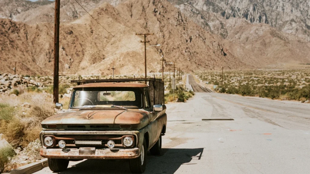 Classic truck photographed at an abandoned-looking location without trespassing