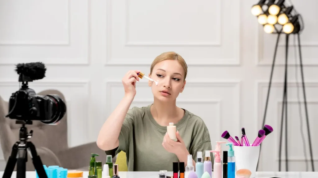 Beauty and cosmetics product photography setup with a model applying skincare product