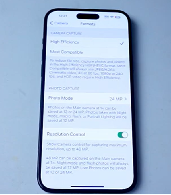 iPhone camera resolution settings showing 24MP photo mode and resolution control for high-resolution sports photography.