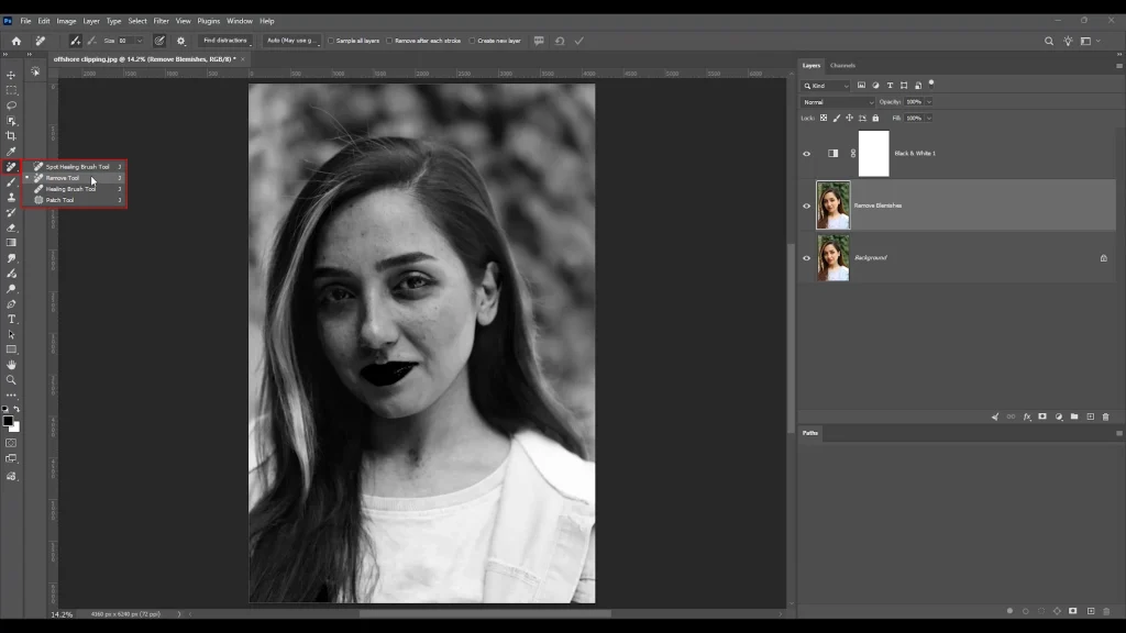 Photoshop toolbar showing the Remove Tool and Spot Healing Brush options for portrait blemish removal.