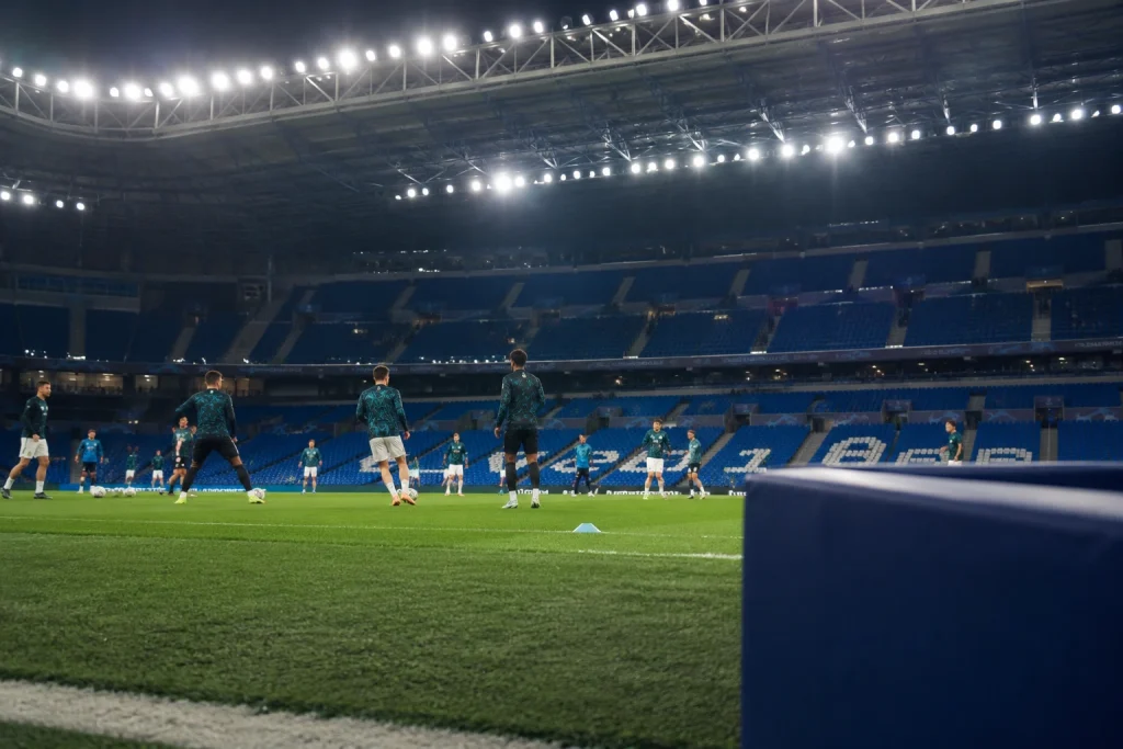 Pre-positioning for capturing peak action in sports photography