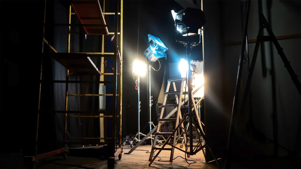 Professional lighting setup for photographing metal, glass, and reflective surfaces in a dark studio