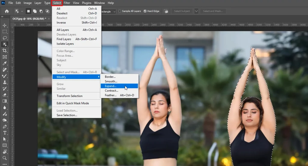 Select, Modify, Expand menu in Photoshop to grow a selection before Generative Fill