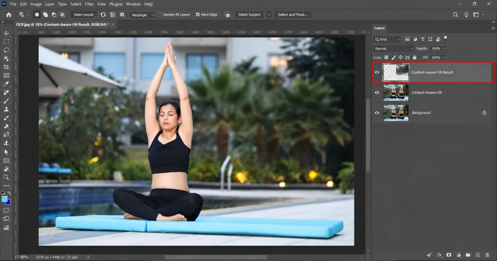 Content-Aware Fill Result layer in Photoshop after removing a person from the photo